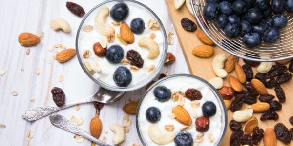 Healthy dessert with yogurt, nuts, oats and blueberries